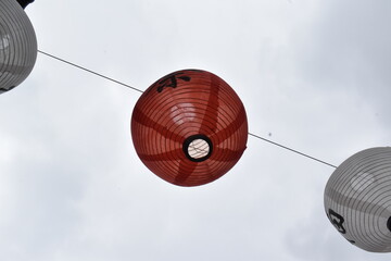 Japanese lantern hanging in the sky background wallpaper
