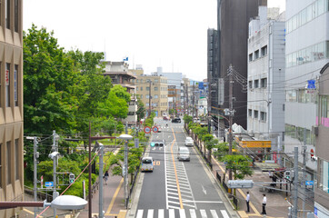 Obraz premium オフィス街の建物と通りの風景