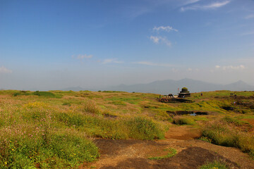 Fototapeta premium Beautiful Indian Landscape. Mountain and Building. Maharashtra state. Pune area.
