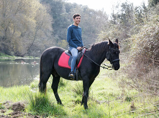 riding man and horse - Powered by Adobe