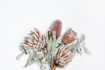 Beautiful dried flower bunch including Eucalyptus leaves,  King Protea and Banksia flowers in red,...