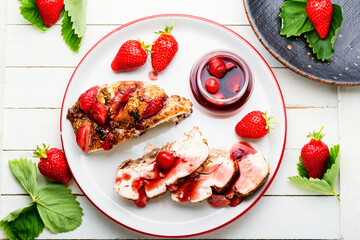 Chicken meat baked with strawberry