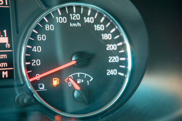 Fototapeta premium car dashboard close up low fuel warning