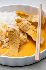 turkey meat with spicy coconut milk sauce and rice noodles