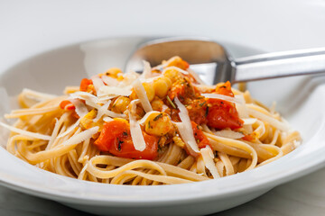 pasta tagliatelle with tomato sauce and chickpeas