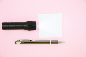 Blank white To Do List Sticker with flashlight and pen. Searching information on the Internet....