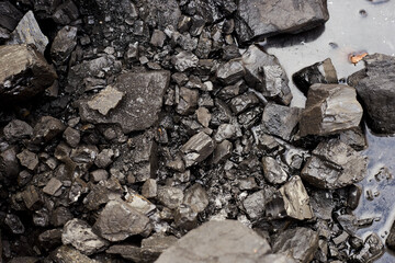 Black charcoal black stones dark fuel energy