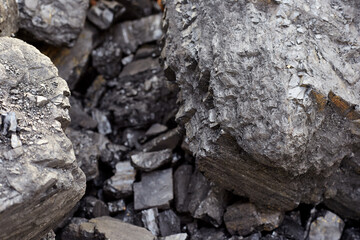 Photos of charcoal, black stones, energy heat