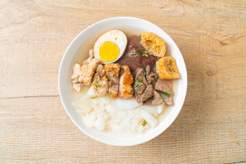 paste of rice flour or boiled Chinese pasta square in clear soup