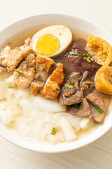 paste of rice flour or boiled Chinese pasta square in clear soup