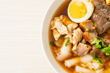 paste of rice flour or boiled Chinese pasta square in clear soup