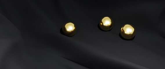 3d render of gold ball and black cloth. iridescent holographic foil. abstract art fashion background.