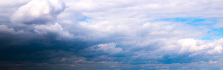 Soft focused Panoramic view of beautiful thunderclouds. Beautiful dramatic  blue sky background....