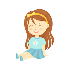 Cute little girl sitting on a floor