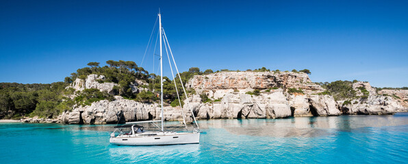 Beautiful bay with sailing boats, Paxos island, Greece. Panoramic view, banner