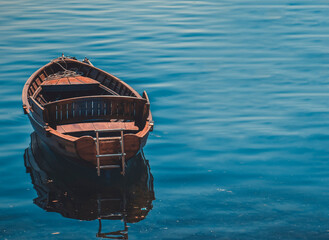 A wooden boat stops at the port