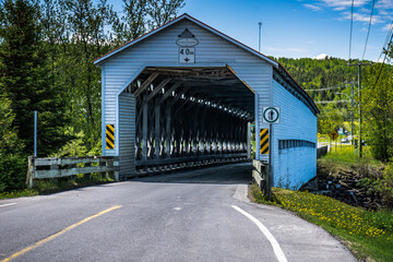 Anse St Jean covered bridge is spanning over the Matapedia river near Amqui in Quebec, Canada