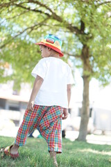 Cute Asian child little Thai boy 2 year old smile make a happy face concept. 