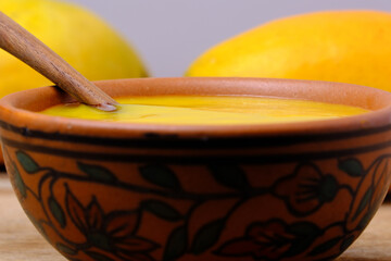 Mango juice or shake in bowl