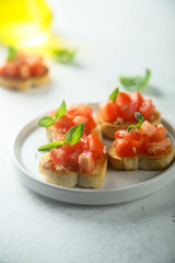 Traditional homemade bruschetta with tomato and basil	