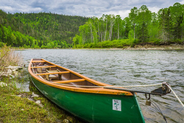 Canadian traditional canoe on the Matapedia River in the province of Quebec (Canada)