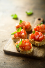 Traditional homemade bruschetta with tomato and basil	