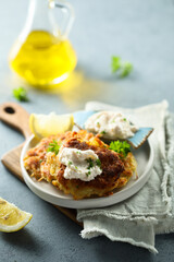 Homemade potato pancakes with cream cheese