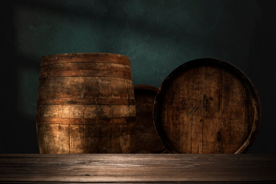 A wine cellar full of barrels of wine