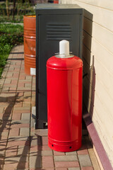 Obraz premium compressed gas, argon or carbon dioxide or oxygen,a steel cylinder outdoors.