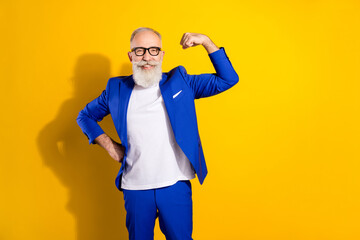Photo portrait of businessman wearing blue suit glasses showing strong muscles personal branding...