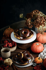 Pumpkin donuts with nutella glaze.