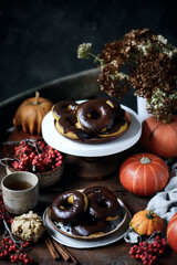 Pumpkin donuts with nutella glaze.