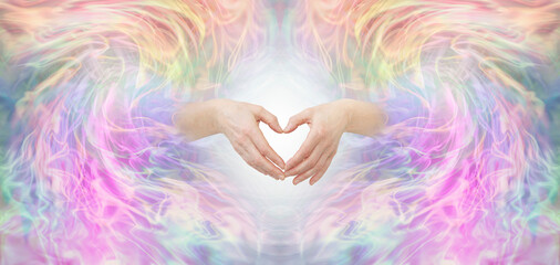 Sending healing Unconditional Love to you - female hands making a heart shape surrounded by a...
