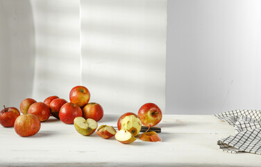 Naklejka na ściany i meble Desk of free space and fresh red apples 