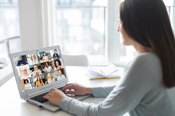 Female freelancer talking online with group of diverse colleagues or classmates, woman participates...