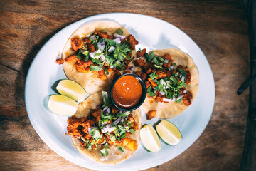 A plate of tacos and tortilla