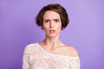 Photo of nice hairdo unsatisfied young girl sullen face look curious camera isolated on violet...