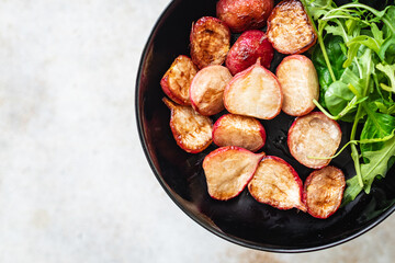 radish fried vegetable original recipe vegetables diet veggie vegan or vegetarian food on the table healthy food meal snack copy space food background rustic top view