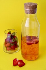 bottle of juice and strawberries