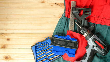 carpenter with tools concept, top view, above over wooden background