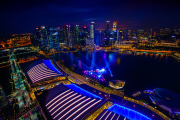 Fototapeta na wymiar Singapore city skyline at Marina bay cityscape by night