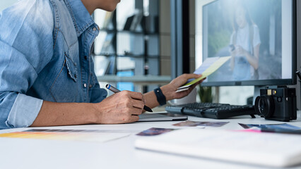 Advertising agency designer creative start-up team discussing ideas in office.