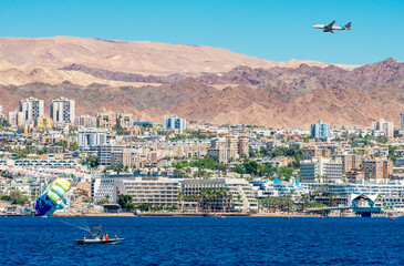 Water sport activities using parachute, flying above the Red Sea, sandy beaches and mountains,...