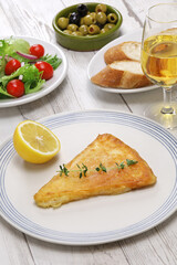 saganaki, Greek fried cheese is one of most popular mezzes in Greek tavernas