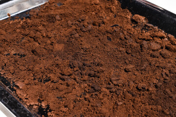 Coffee grounds dried in the sunlight