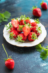 Strawberry fresh fruit berries ripe  sweet dessert summer organic on the table healthy meal copy space food background rustic top view keto or paleo diet vegan or vegetarian food