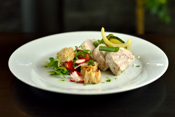 Plate with delicious aspic on dark wooden table