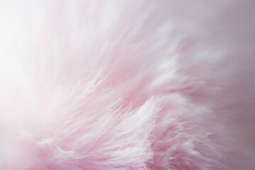 Blurred light pink artificial fur in soft color for background