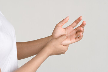 Obraz na płótnie Canvas woman wrist arm pain. office syndrome healthcare and medicine concept