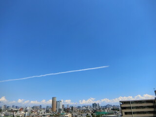 Contrails in the blue sky